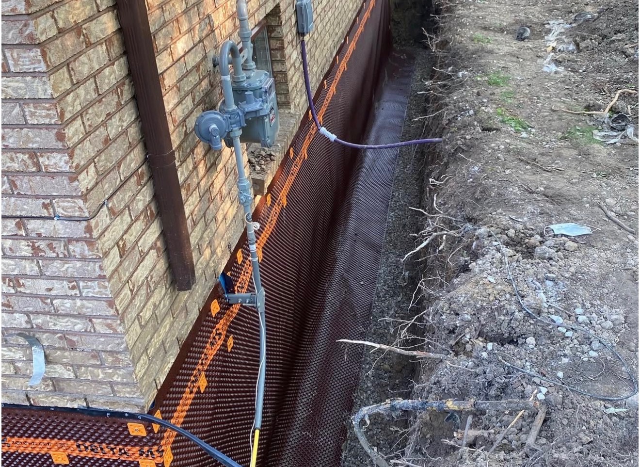 Exterior sump pump discharge